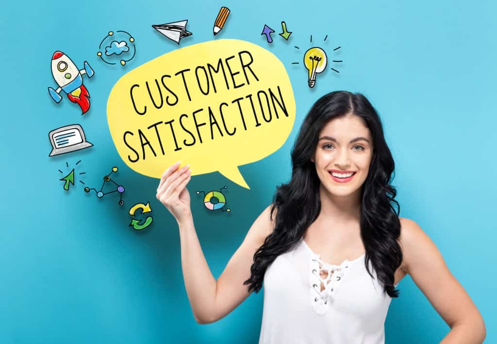 Customer Satisfaction with young woman holding a speech bubble