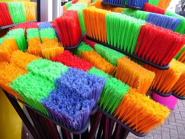 multicolored brooms